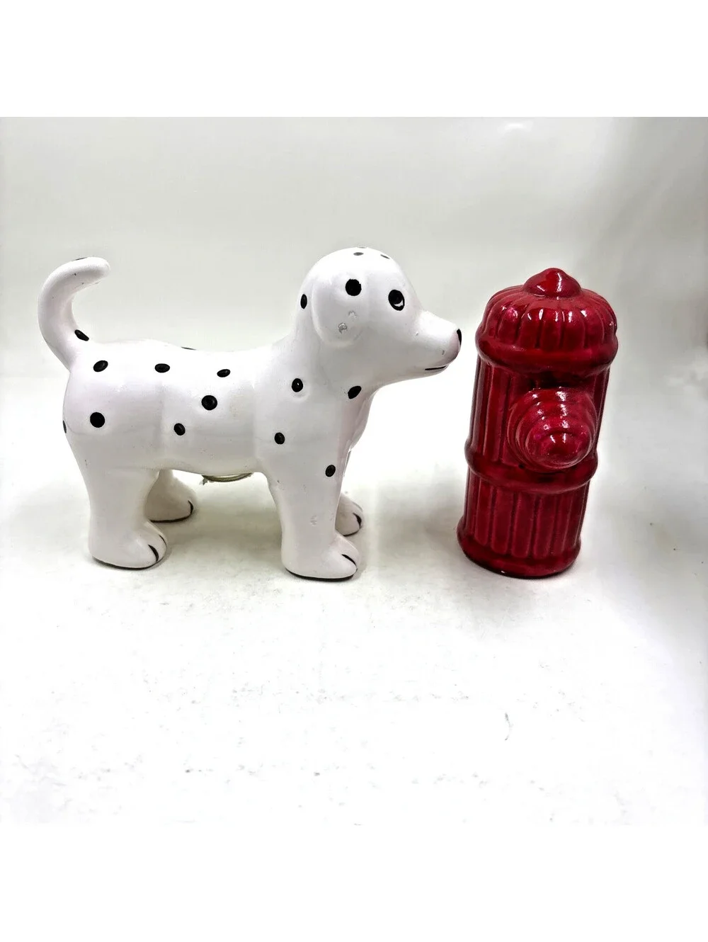 Ceramic Dalmatian dog and fire hydrant ceramic salt & pepper shaker set